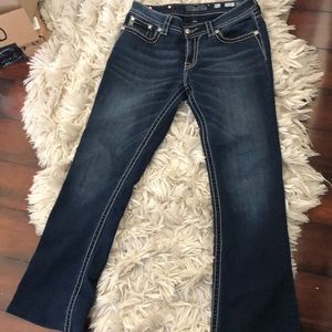 Miss me jeans signifies rise boot cut
